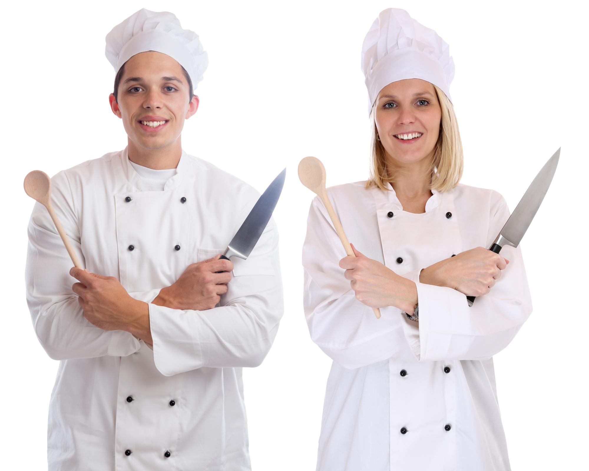 Chef demonstrating knife skills to a small group